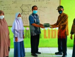 Pencegahan Covid-19, Kades Bontomacinna Bagikan Masker Gratis di Sekolah